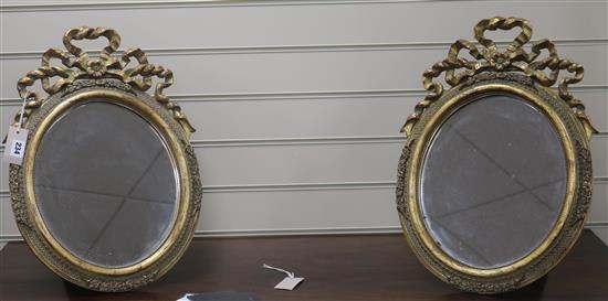 A pair of gilt easel mirrors